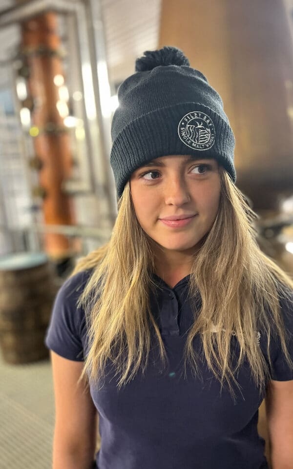 Team member Libby showing off the Filey Bay Bobble Hat